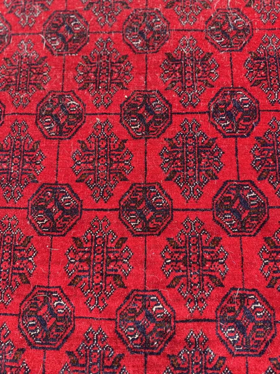 Khal Mohammadi rug — deep red field with large gul repeat