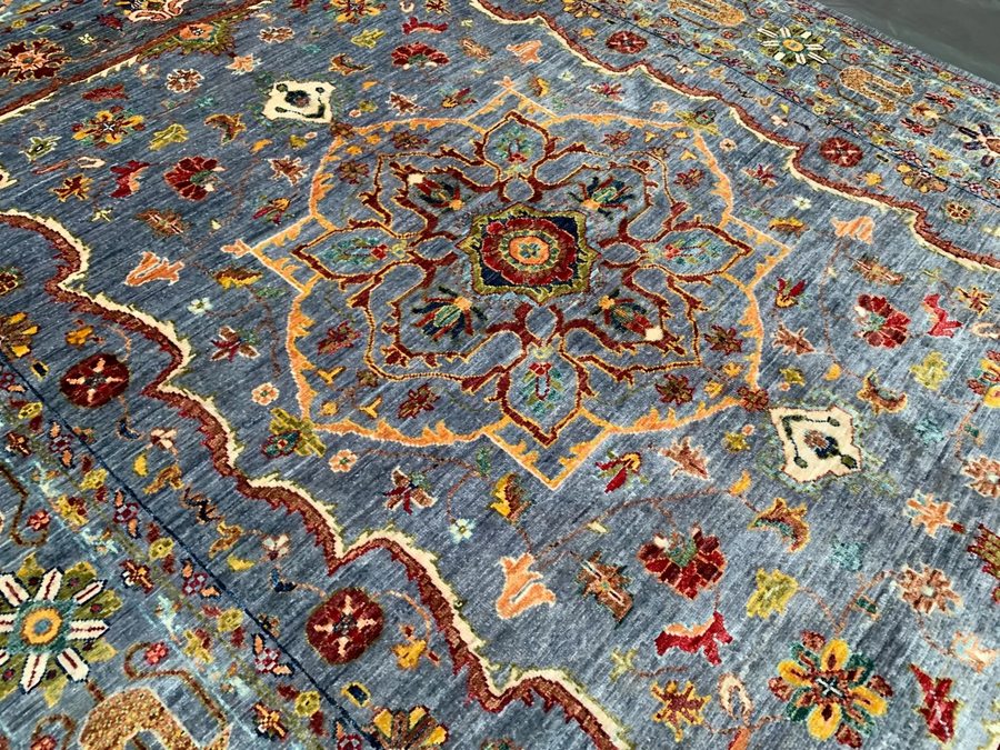 Ziegler wash Afghan rug — blue-grey field with medallion and soft palette