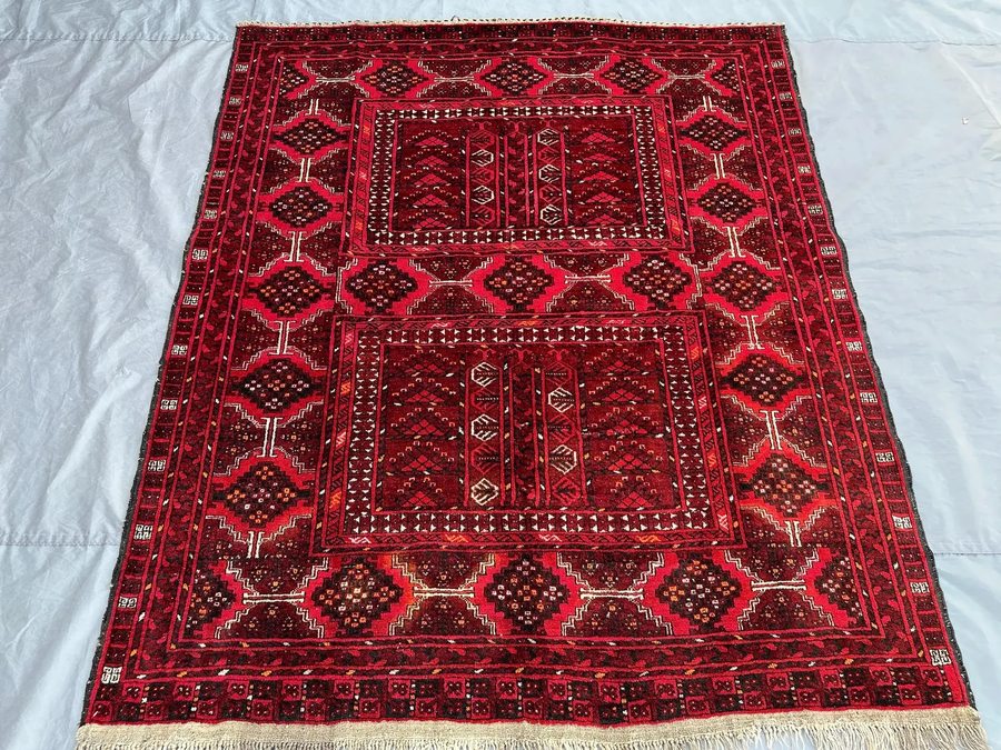 Ersari Afghan rug — dark red geometric tribal panels
