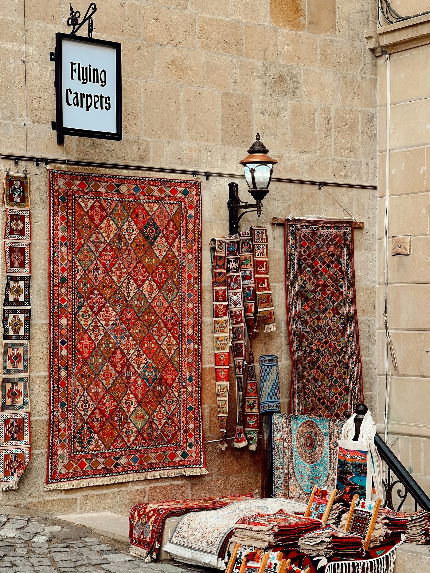 Caucasus rugs displayed in Baku old city market