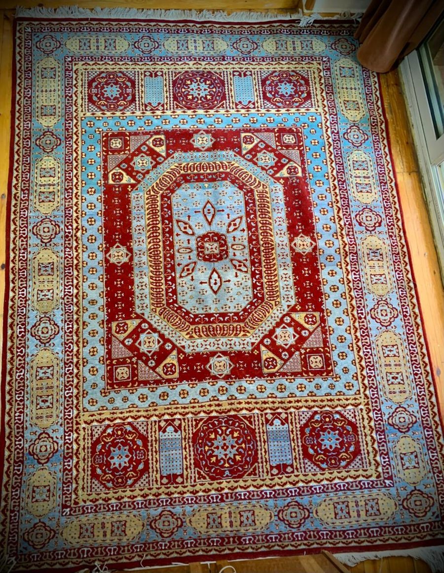 Egyptian Mamluk-style rug — crimson field with geometric medallion
