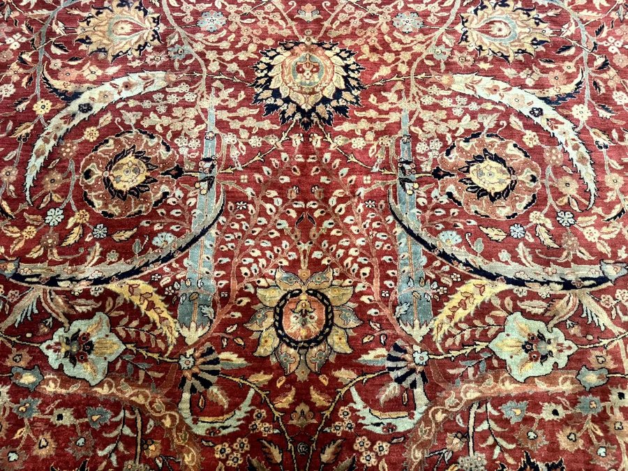 Agra workshop rug — deep red field with lush floral arabesque