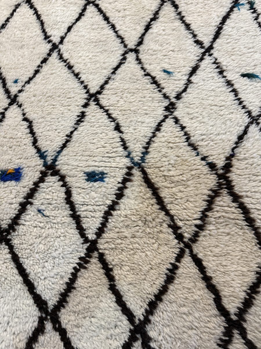 Beni Ourain rug — ivory field with black diamond lattice