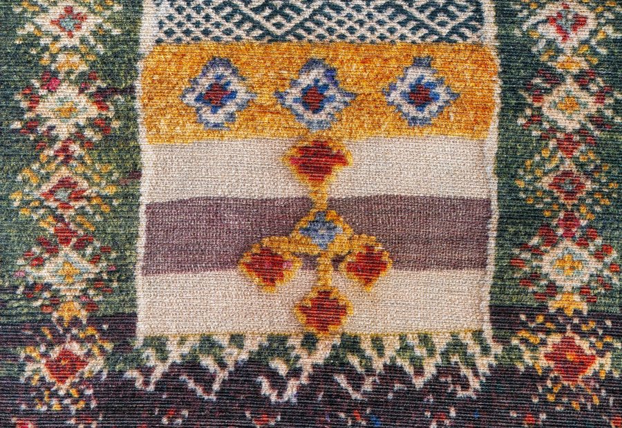 Taznakht rug — green field with geometric panel motifs, Anti-Atlas Mountains
