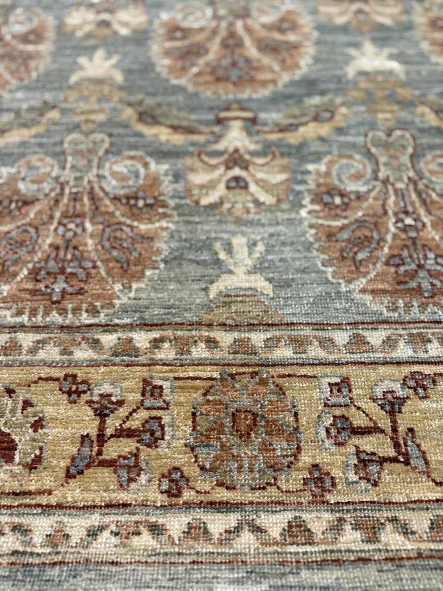 Fine Lahore rug — blue-grey field with intricate terracotta floral arabesque
